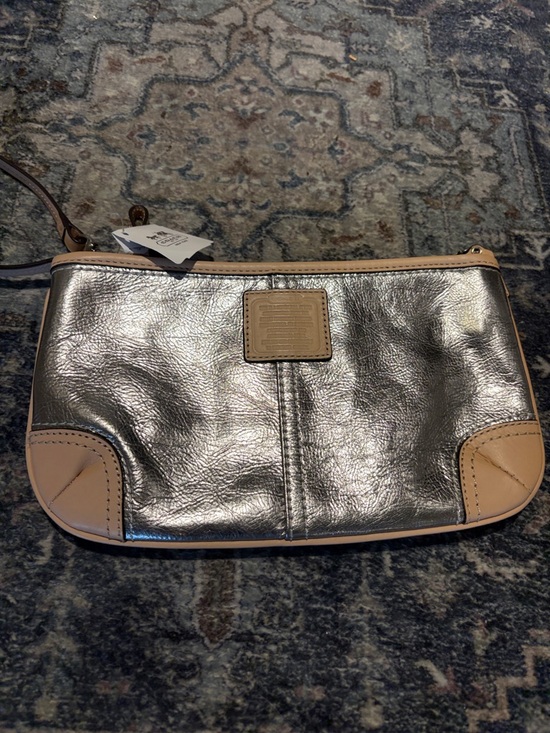 Coach Handbags - Coach Metallic Silver Wristlet with Beige Trim